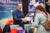 Exhibitors-interacting-with-Customers-Books