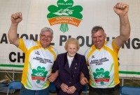 Conventional champion Eamonn Tracey, Carlow and Reversible champion John Whelan, Wexford with Anna May McHugh on Thursday, Ploughing 2025.

Photo: Alf Harvey, no reproduction fee.